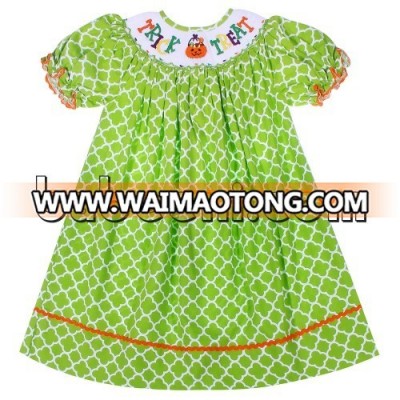 Wholesale smocked girl dresses for Halloween with trick or treat pattern